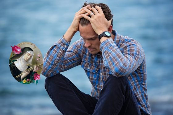 Man in Blue and Brown Plaid Dress Shirt Touching His Hair